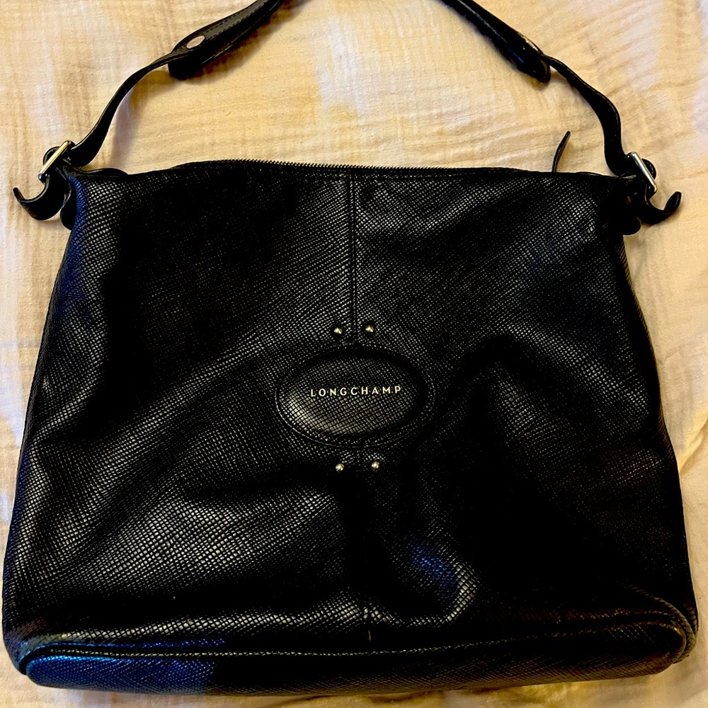 Longchamp black tote bag. Lightly used. In great condition. Can be used as purse